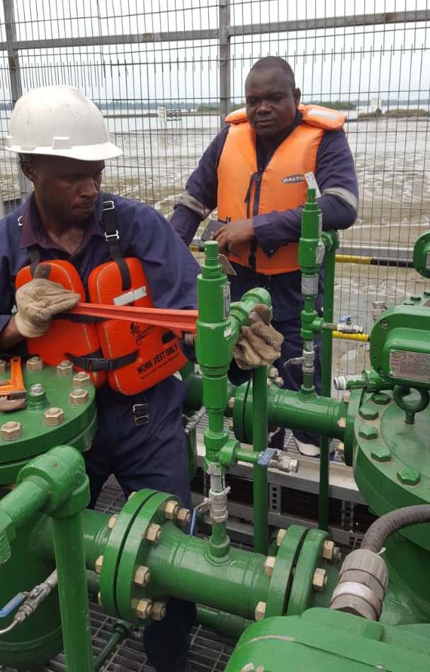 Thrust Engineering personnel performing integrity checks on a metering skid